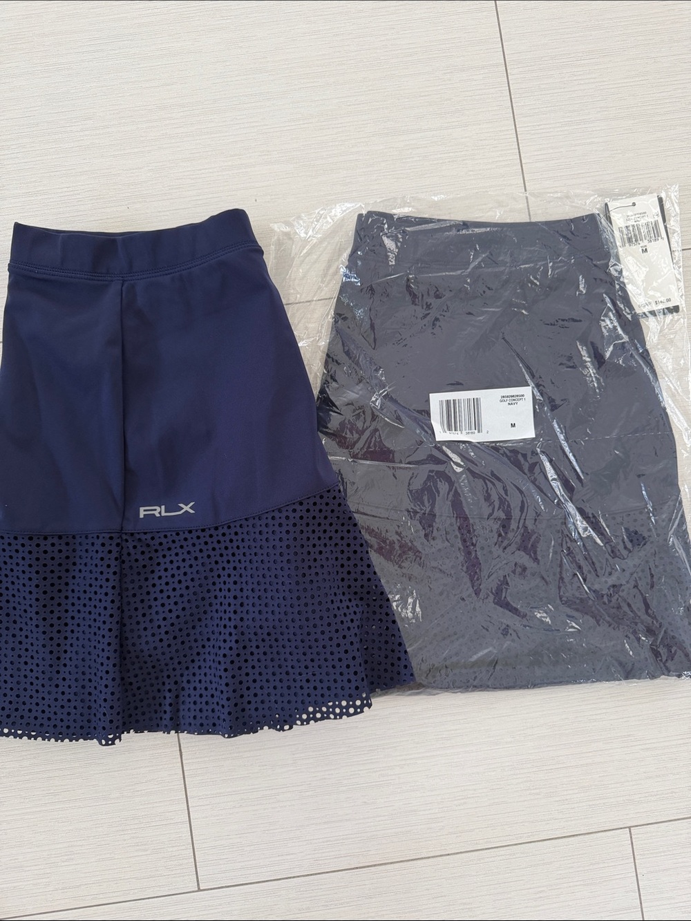 RLX Ralph Lauren Navy women’s golf/performance Skort - NWT